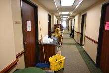 View of resident hall corridor with cleaning equipment